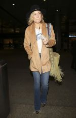 KATE HUDSON Arrives at LAX Airport in Los Angeles 03/06/2016