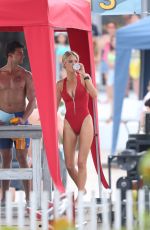 KELLY ROHRBACH in Red Swimsuit on Set of Baywatch 03/04/2016