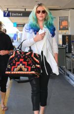 KESHA SEBERT at Los Angeles International Airport 03/19/2016