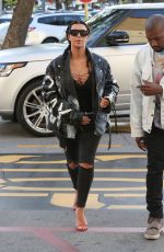 KIM KARDASHIAN and Kanye West at a Movie Date Night in Woodland Hills 03/12/2016