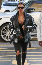 KIM KARDASHIAN and Kanye West at a Movie Date Night in Woodland Hills 03/12/2016