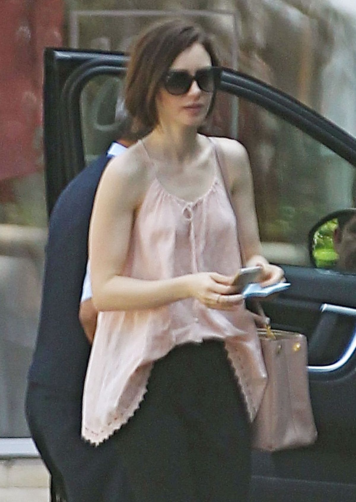 LILY COLLINS Arrives at Peninsula Hotel in Beverly Hills 03/18/2016 LILY COLLINS Arrives at Peninsula Hotel in Beverly Hills 03/18/2016