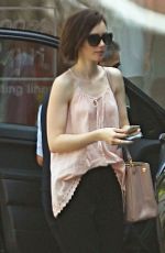 LILY COLLINS Arrives at Peninsula Hotel in Beverly Hills 03/18/2016