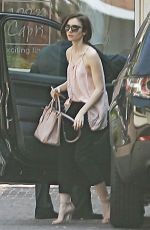 LILY COLLINS Arrives at Peninsula Hotel in Beverly Hills 03/18/2016