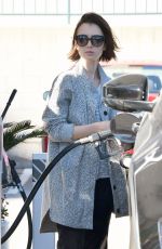LILY COLLINS at a Gas Station in Los Angeles 03/08/2016