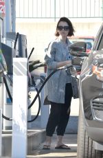 LILY COLLINS at a Gas Station in Los Angeles 03/08/2016