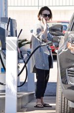 LILY COLLINS at a Gas Station in Los Angeles 03/08/2016