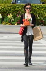 LILY COLLINS Leaves Bristol Farms Market in Los Angeles 03/10/2016