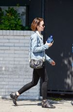 LILY COLLINS Leaves Chateau Marmont in Los Angeles 03/27/2016