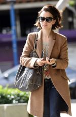 LILY COLLINS Leaves Her Apartment in Los Angeles 03/07/2016