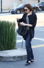 LILY COLLINS Out and About in Beverly Hills 03/17/2016