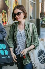 LILY COLLINS Shopping at Erewhon Health Food Store in Los Angeles 03/15/2016