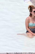 LUCY HALE in Bikini at a Pool at Her Hotel in Brazil 03/07/2016