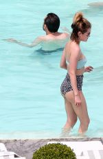 LUCY HALE in Bikini at a Pool at Her Hotel in Brazil 03/07/2016