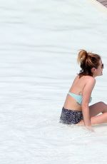 LUCY HALE in Bikini at a Pool at Her Hotel in Brazil 03/07/2016
