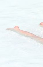 LUCY HALE in Bikini at a Pool at Her Hotel in Brazil 03/07/2016