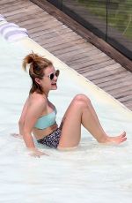 LUCY HALE in Bikini at a Pool at Her Hotel in Brazil 03/07/2016