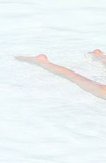 LUCY HALE in Bikini at a Pool at Her Hotel in Brazil 03/07/2016