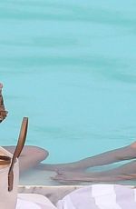 LUCY HALE in Bikini at a Pool at Her Hotel in Brazil 03/07/2016