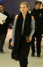MARGOT ROBBIE Arrives at JFK Airport in New York 03/02/2016