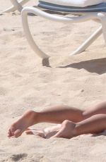 MARIA SHARAPOVA in Red Bikini at a Beach in Mexico 03/27/2016