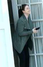 MICHELLE TRACHTENBERG Peeks Her Head Out of an Office in Los Angeles 03/14/2016