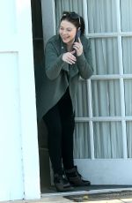 MICHELLE TRACHTENBERG Peeks Her Head Out of an Office in Los Angeles 03/14/2016