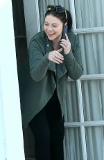 MICHELLE TRACHTENBERG Peeks Her Head Out of an Office in Los Angeles 03/14/2016