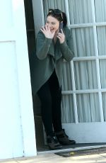 MICHELLE TRACHTENBERG Peeks Her Head Out of an Office in Los Angeles 03/14/2016