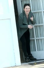 MICHELLE TRACHTENBERG Peeks Her Head Out of an Office in Los Angeles 03/14/2016