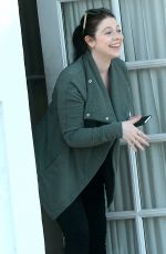 MICHELLE TRACHTENBERG Peeks Her Head Out of an Office in Los Angeles 03/14/2016