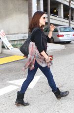NEVE CAMPBELL at Los Angeles International Airport 03/07/2016
