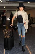 NIKKI REED at Ripped Jeans at LAX Airport in Los Angeles 03/17/2016