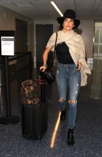 NIKKI REED at Ripped Jeans at LAX Airport in Los Angeles 03/17/2016