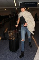 NIKKI REED at Ripped Jeans at LAX Airport in Los Angeles 03/17/2016