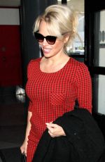 PAMELA ANDERSON Arrives at Los Angeles International Airport 03/24/2016