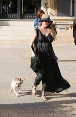Pregnant CHRISSY TEIGEN Walks Her Dog Out in Beverly Hills 03/14/2016