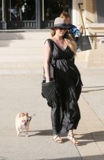Pregnant CHRISSY TEIGEN Walks Her Dog Out in Beverly Hills 03/14/2016