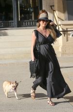 Pregnant CHRISSY TEIGEN Walks Her Dog Out in Beverly Hills 03/14/2016
