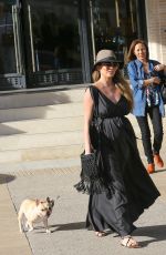 Pregnant CHRISSY TEIGEN Walks Her Dog Out in Beverly Hills 03/14/2016