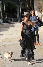 Pregnant CHRISSY TEIGEN Walks Her Dog Out in Beverly Hills 03/14/2016