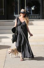 Pregnant CHRISSY TEIGEN Walks Her Dog Out in Beverly Hills 03/14/2016