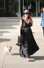 Pregnant CHRISSY TEIGEN Walks Her Dog Out in Beverly Hills 03/14/2016