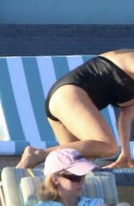 REESE WITHERSPOON in Swimsuit at a Pool in Cabo San Lucas 03/02/2016