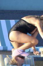 REESE WITHERSPOON in Swimsuit at a Pool in Cabo San Lucas 03/02/2016