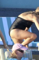 REESE WITHERSPOON in Swimsuit at a Pool in Cabo San Lucas 03/02/2016