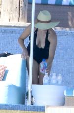 REESE WITHERSPOON in Swimsuit at a Pool in Cabo San Lucas 03/02/2016