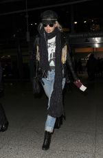 RITA ORA at Heathrow Airport in London 03/06/2016