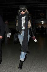 RITA ORA at Heathrow Airport in London 03/06/2016