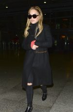 RITA ORA at Heathrow Airport in London 03/18/2016